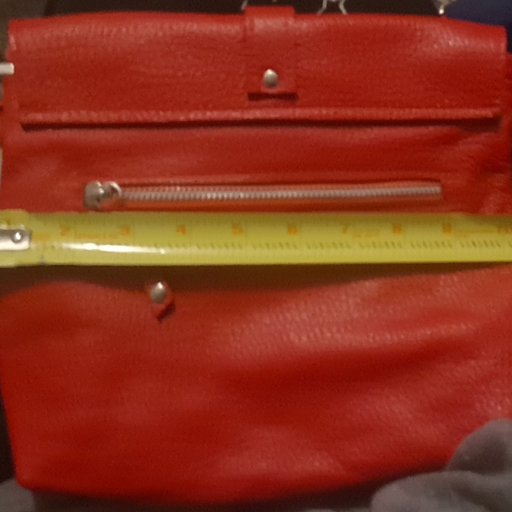 New buttery leather red crossbody. Snap Closure. Clean Inside. 1 Pocket In/out. - Picture 6 of 8